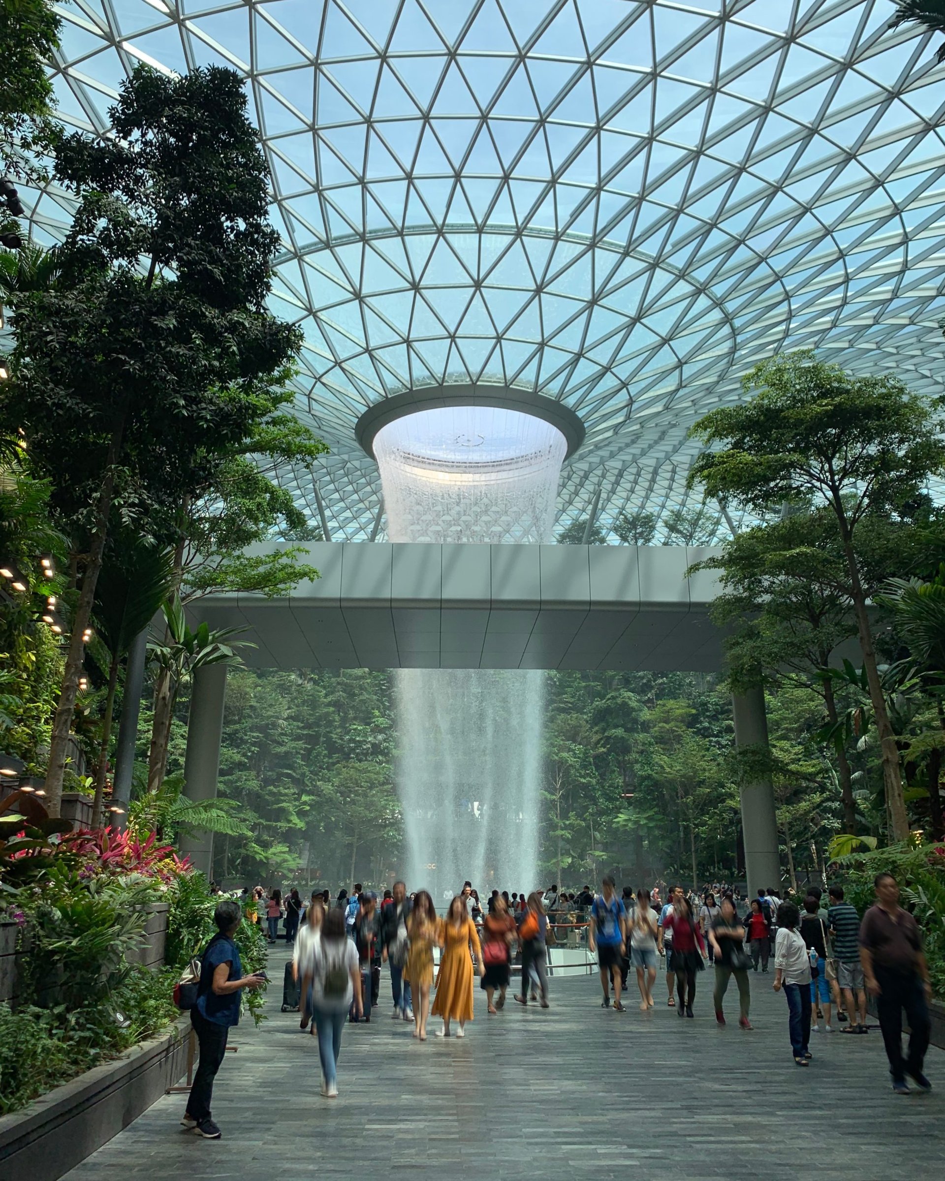 Rain Vortex 40-meter indoor waterfall at Jewel Changi Airport Singapore Forest Valley designed by WET Design beneath Safdie Architects geodesic glass dome